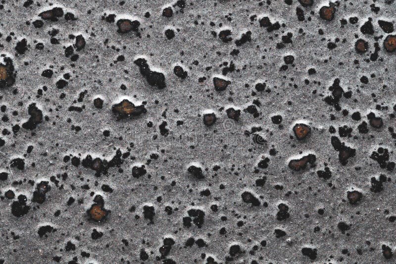 Gray grunge texture. rough wall background. stone surface with spots