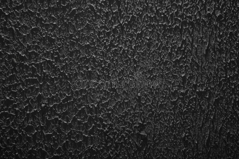 Textura, bruto en mal estado oscuro, negro yeso estuco negro muro.