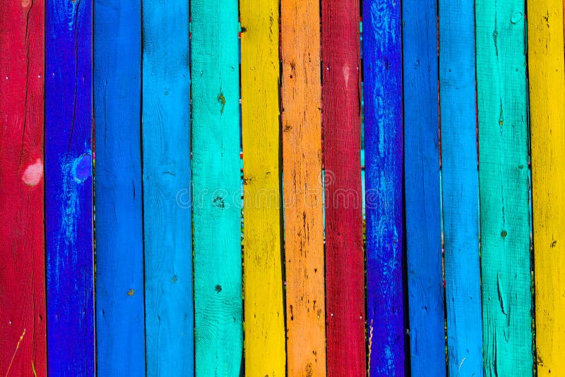 Grunge wooden colored background - paint a rainbow on old fence stock photos Grunge wooden colored background - paint a rainbow on old fence stock photos