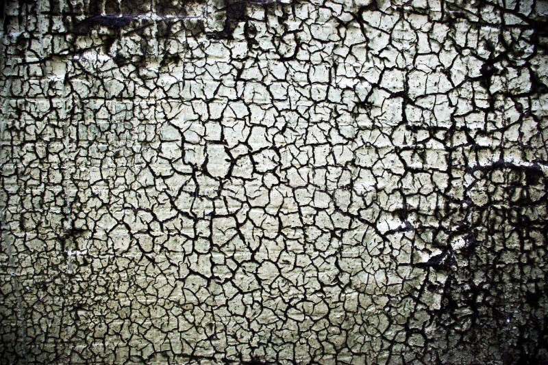 Closeup a fragment of the grungy weathered wall of a building. Closeup a fragment of the grungy weathered wall of a building