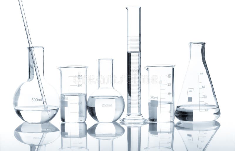 Group of laboratory flasks with a clear liquid, isolated. Group of laboratory flasks with a clear liquid, isolated