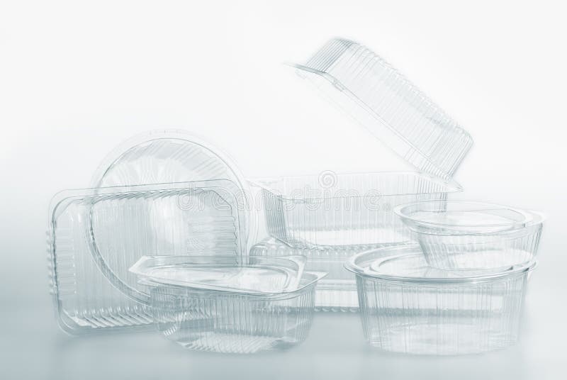 Grupa przejrzysty plastikowych zbiorników pudełkowaty karmowy pakunek na bielu zdjęcia stock Grupa przejrzysty plastikowych zbiorników pudełkowaty karmowy pakunek na bielu zdjęcia stock