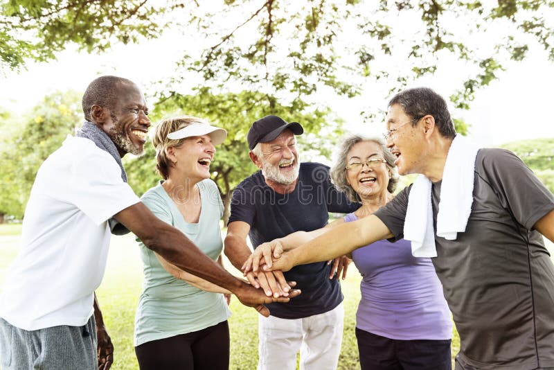 Group Of Senior Retirement Exercising Togetherness. Group Of Senior Retirement Exercising Togetherness