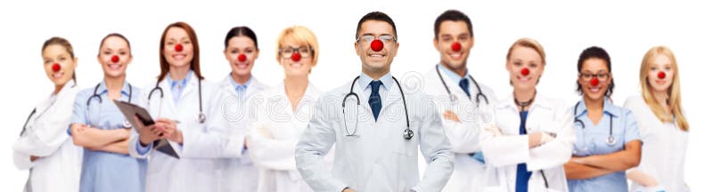 Grupo de doutores de sorriso no dia vermelho do nariz imagens de stock Grupo de doutores de sorriso no dia vermelho do nariz imagens de stock