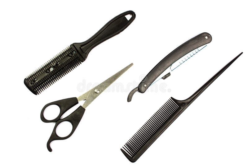 Grupo de ferramentas do corte do cabelo no fundo branco imagem de stock Grupo de ferramentas do corte do cabelo no fundo branco imagem de stock