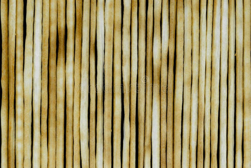 Grupo de fundo cozido das varas de pão italiano na superfície preta do fundo foto de stock Grupo de fundo cozido das varas de pão italiano na superfície preta do fundo foto de stock