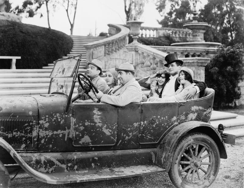 Grupo de personas en un coche (todas las personas representadas no son vivas más largo y ningún estado existe Garantías del prove fotografía de archivo libre de regalías Grupo de personas en un coche (todas las personas representadas no son vivas más largo y ningún estado existe Garantías del prove fotografía de archivo libre de regalías