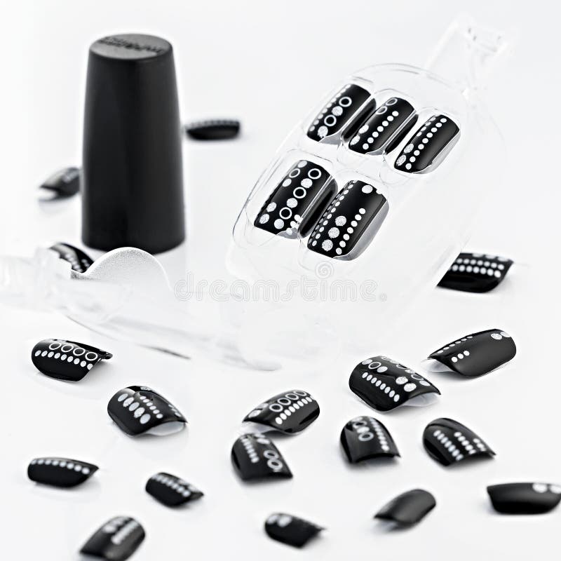 Set of Black and white false nails, on white background. Set of Black and white false nails, on white background