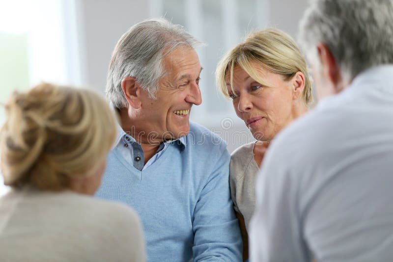 Couple attending group therapy together. Couple attending group therapy together