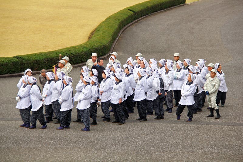 Grupp av höga japanska turister royaltyfri foto Grupp av höga japanska turister royaltyfri foto