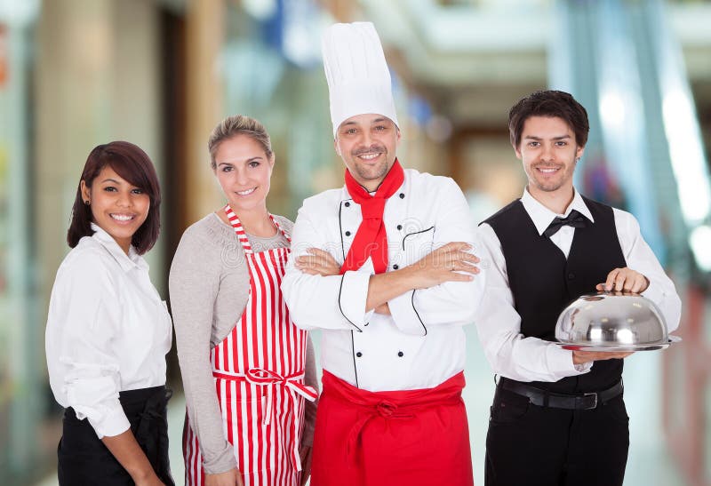 Grupp av restaurangpersonalen arkivbilder Grupp av restaurangpersonalen arkivbilder