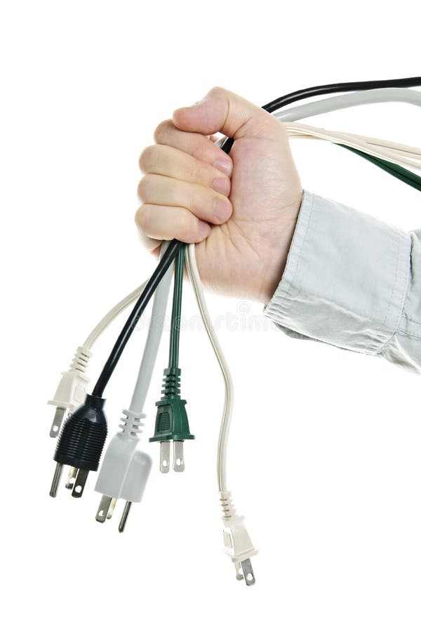 Gruppo della holding della mano dei cavi elettrici fotografia stock