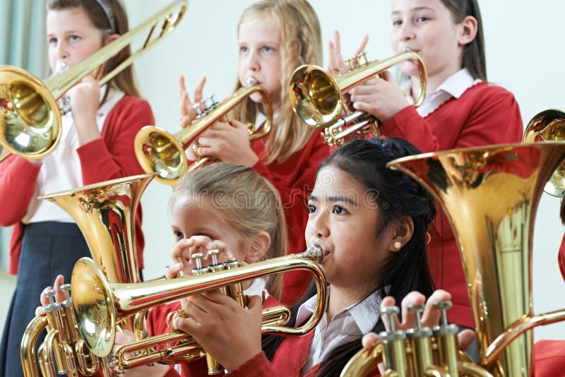 Students Playing In School Orchestra Together. Students Playing In School Orchestra Together