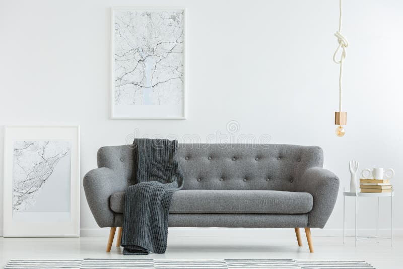 Grå färgvardagsrum med filten fotografering för bildbyråer Grå färgvardagsrum med filten fotografering för bildbyråer