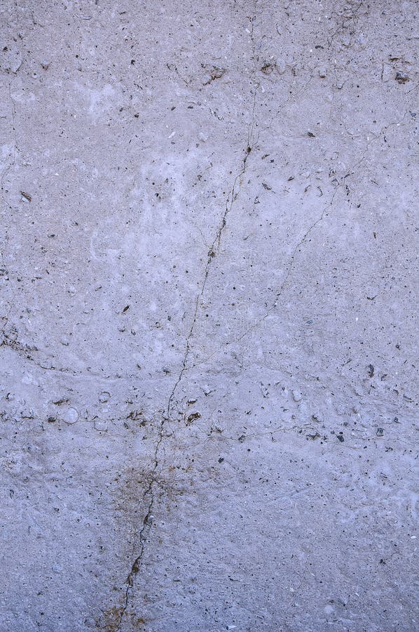 Grå konkret texturbakgrund skada Sprucken stenväggbakgrund arkivfoto Grå konkret texturbakgrund skada Sprucken stenväggbakgrund arkivfoto