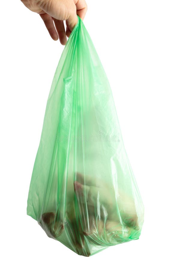 Grön förpackning med kött i hand, isolerat på vitt royaltyfri bild