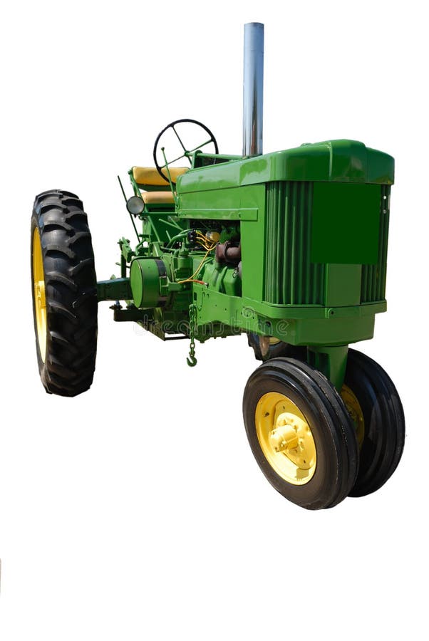 Grön traktor för tappning royaltyfria foton