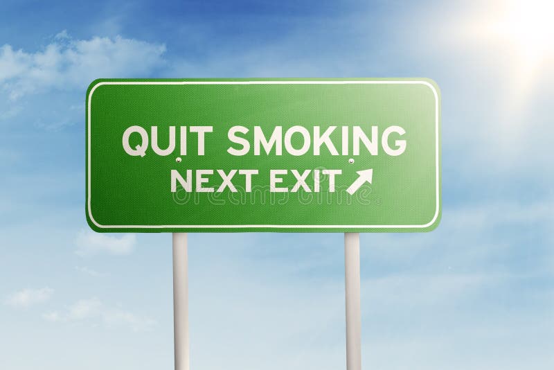 Picture of a green signpost with text of quit smoking and next exit, shot under blue sky. Picture of a green signpost with text of quit smoking and next exit, shot under blue sky