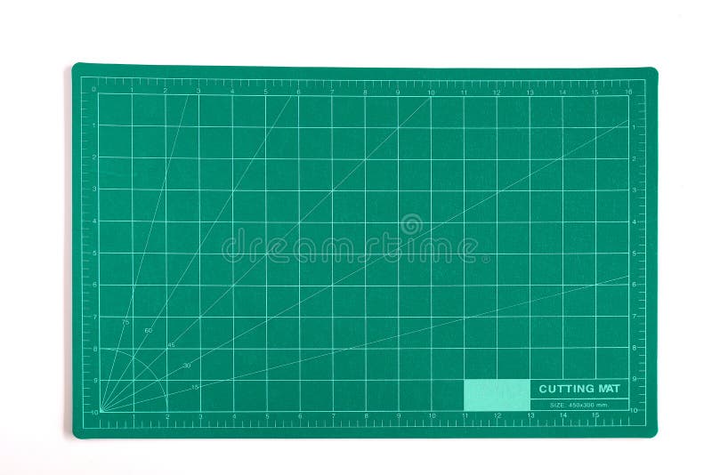 Green grid cutting matt or pad on background. Green grid cutting matt or pad on background