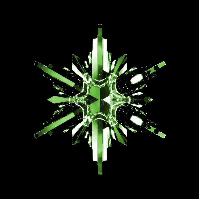 A beautifully crafted green glass crystal in the shape of a snowflake, isolated on a black background. A beautifully crafted green glass crystal in the shape of a snowflake, isolated on a black background.