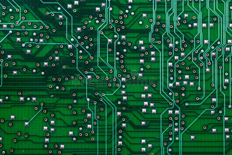 Printed green computer circuit board with many electrical components. Printed green computer circuit board with many electrical components