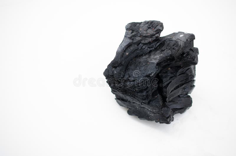 Grămadă de cărbune izolată pe fond alb. stock photography