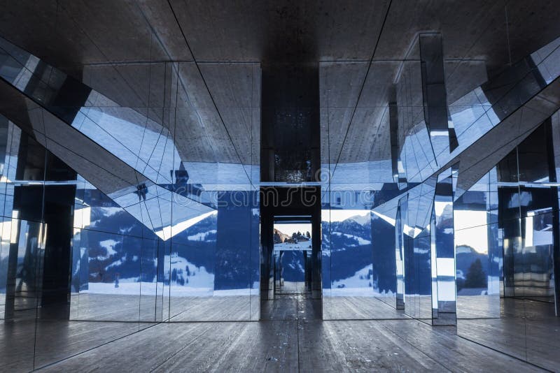 The Swiss Alps winter landscape reflected in the interior of Mirage Gstaad