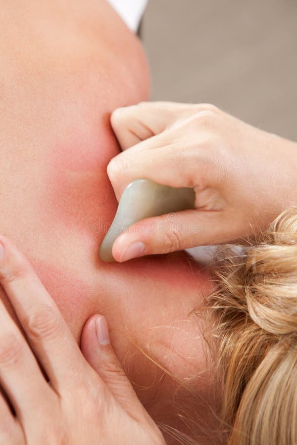 Gua Sha Acupressure Treatment stock photos