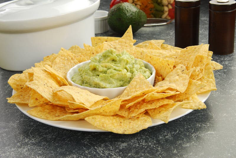 Guacamole and chips stock image. Image of brocoliflower 17289531