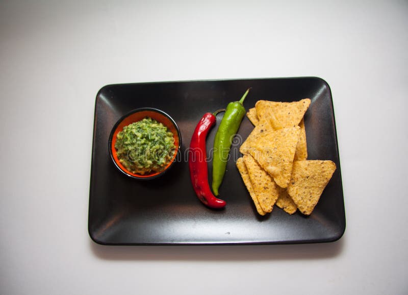 Guacamole and corn chips stock image. Image of avocado 63522181