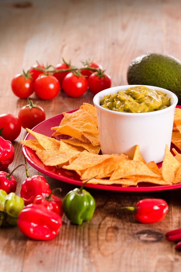 Guacamole and nacho chips. stock photo. Image of mexican 81675296