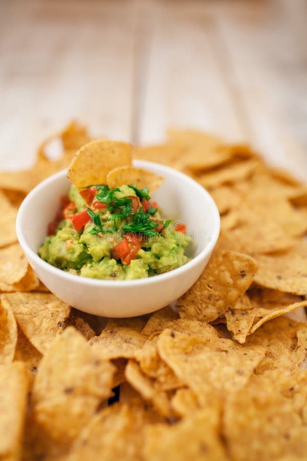 Guacamole with Tortilla Chips Stock Image Image of chips, limes 46489017