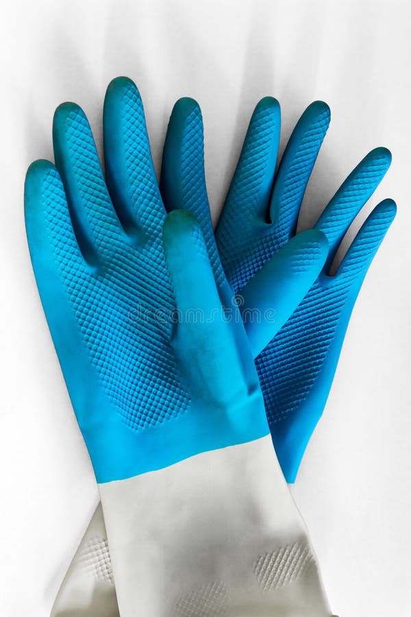 Guanti blu per pulizia e protezione delle mani, su fondo bianco lavoro del giardino, lavoro con la terra, pulizia aggressiva immagini stock libere da diritti Guanti blu per pulizia e protezione delle mani, su fondo bianco lavoro del giardino, lavoro con la terra, pulizia aggressiva immagini stock libere da diritti