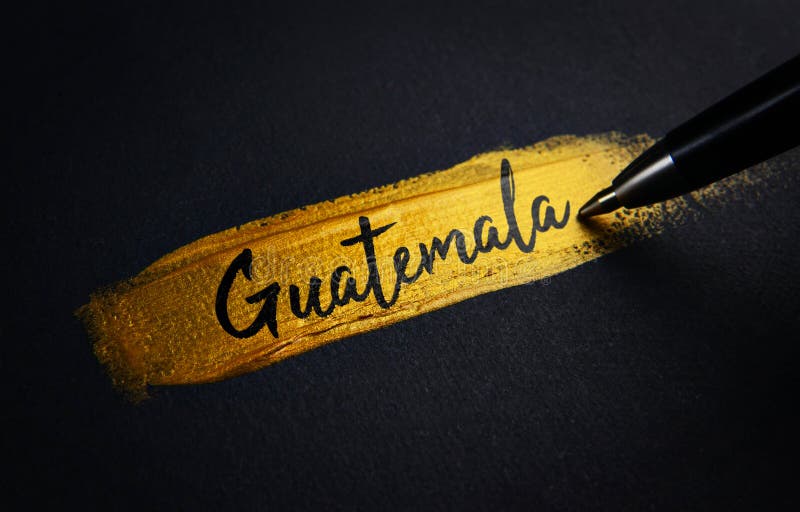 Guatemala Handwriting Text on Golden Paint Brush Stroke Stock Photo