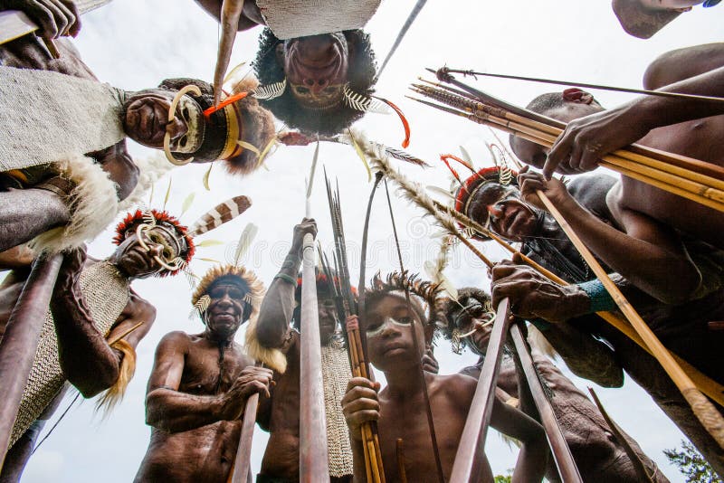 DANI VILLAGE, WAMENA, IRIAN JAYA, NEW GUINEA, INDONESIA â€“ 25 JULY 2009: Dani tribe Warriors. DANI VILLAGE, WAMENA, IRIAN JAYA, NEW GUINEA, INDONESIA â€“ 25 JULY 2009: Dani tribe Warriors.