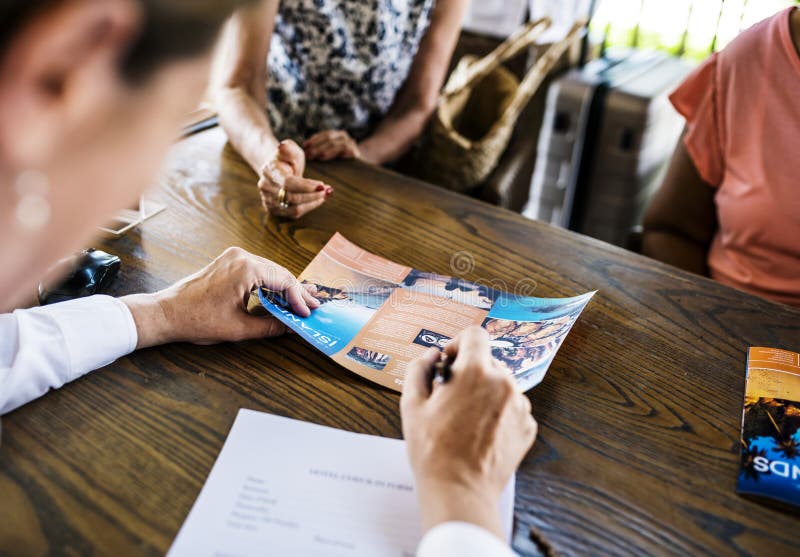 Guest booking a tour at a hotel stock images