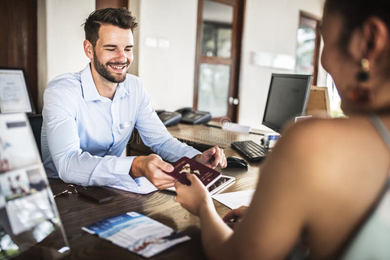 Guests checking in to a hotel royalty free stock photo