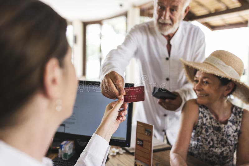 Guests checking in to a hotel royalty free stock photos
