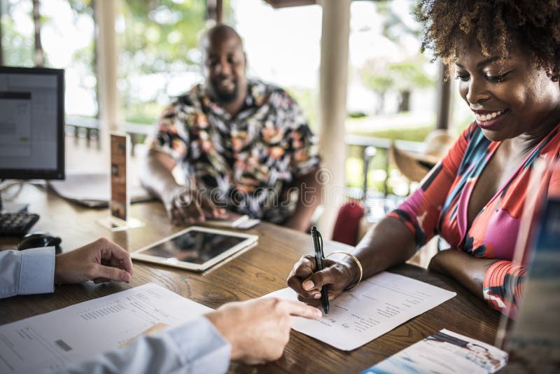 Guests checking in to a hotel royalty free stock photos