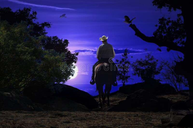 A cowboy riding a horse on a mountain trail into the night. A cowboy riding a horse on a mountain trail into the night.