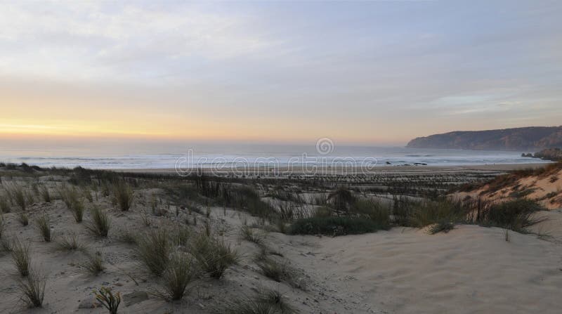 Famous Guincho Beach at sundown, Cascais, near Lisbon, Portugal. Famous Guincho Beach at sundown, Cascais, near Lisbon, Portugal.