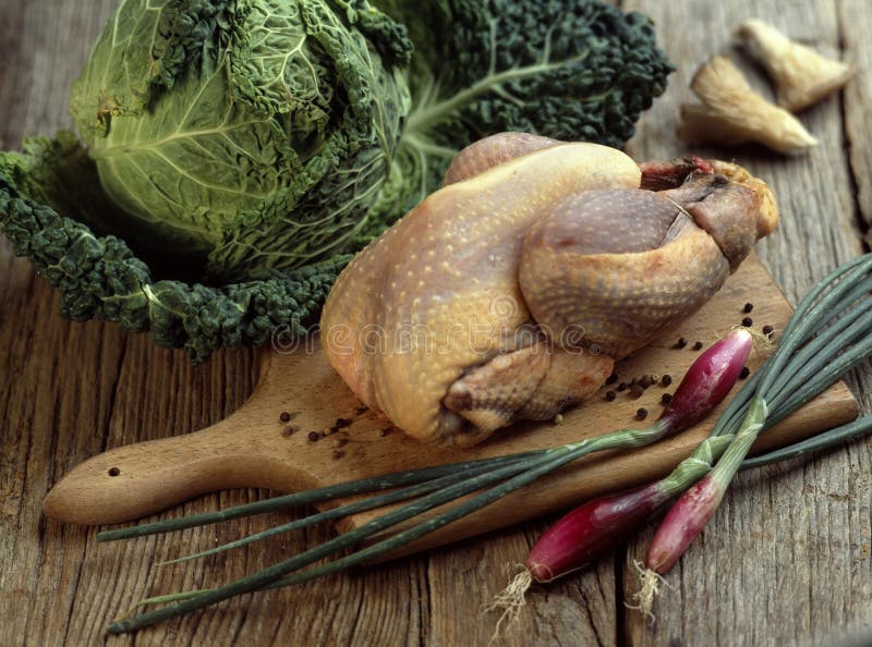 Whole raw guinea-fowl,Food, gastronomy,culinary,cookery. Whole raw guinea-fowl,Food, gastronomy,culinary,cookery