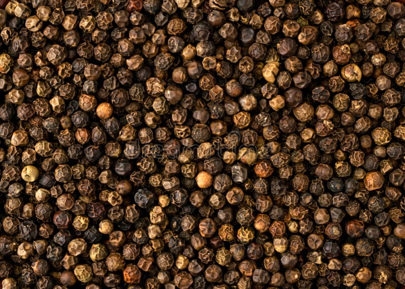 Guisantes de la pimienta negra, fondo La vista del top imagen de archivo libre de regalías