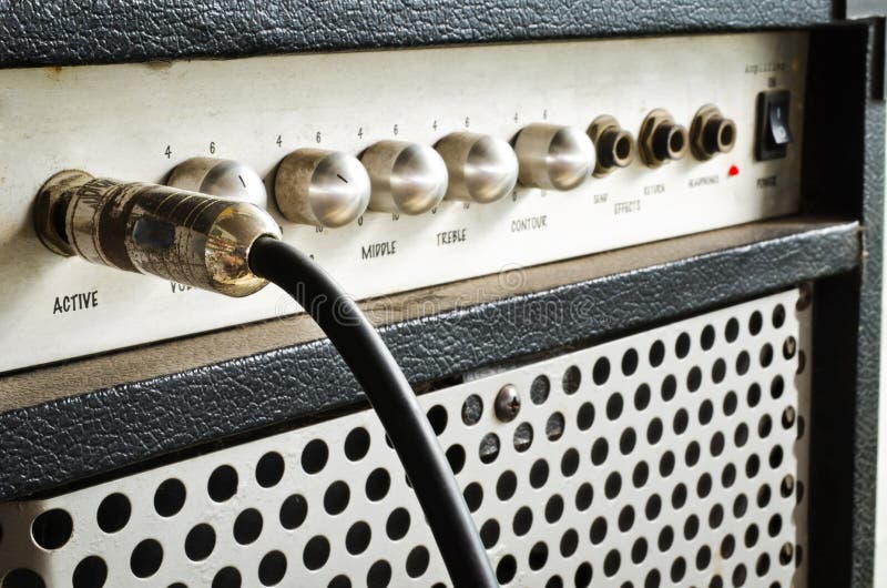 Close Up Of Black Guitar Amplifier With Jack Cable Stock Image Image