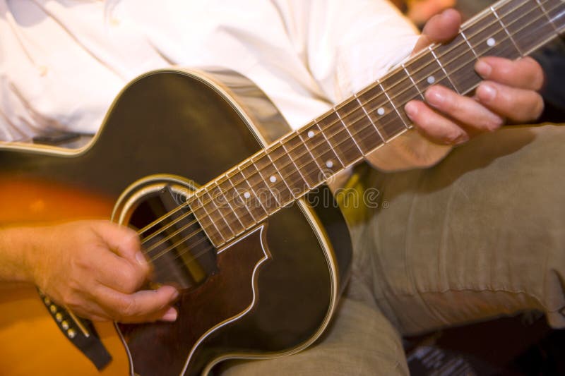 large string instrument played with fingers large string instrument played with fingers
