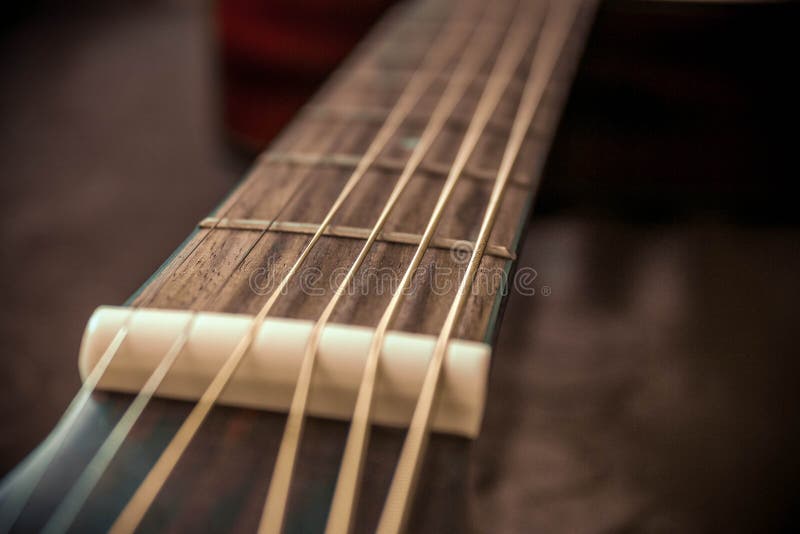 Guitar frets and strings stock image. Image of wood, board 50611559