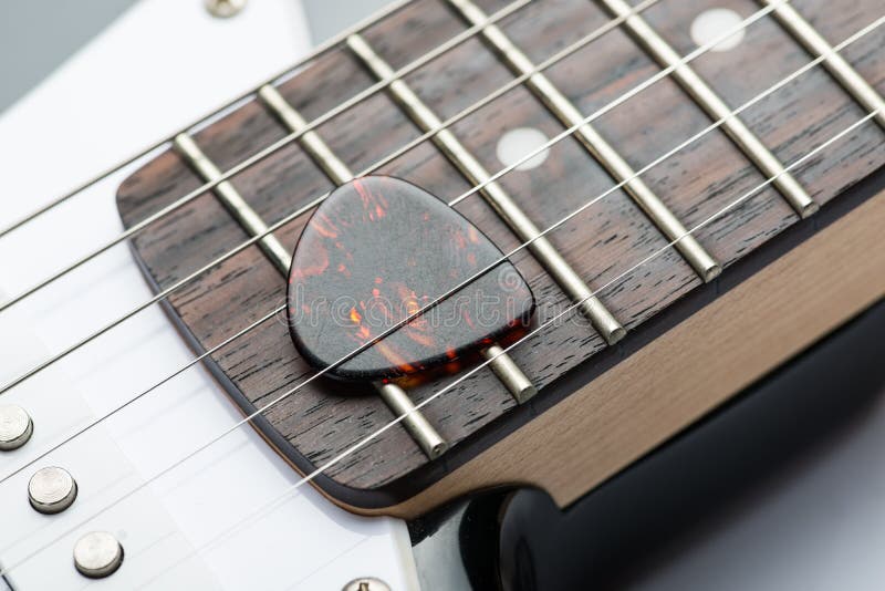 Guitar Frets with Strings and Mediator Stock Photo Image of neck