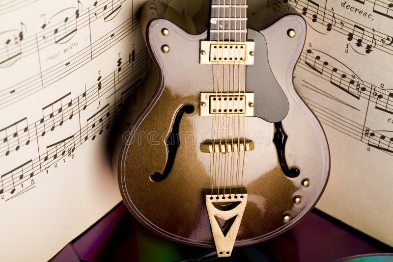 Guitar and old notes stock photos