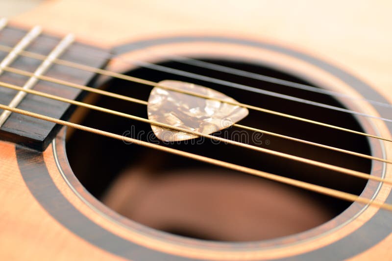 Guitar and pick stock photo. Image of bolt, enjoyment 52172050