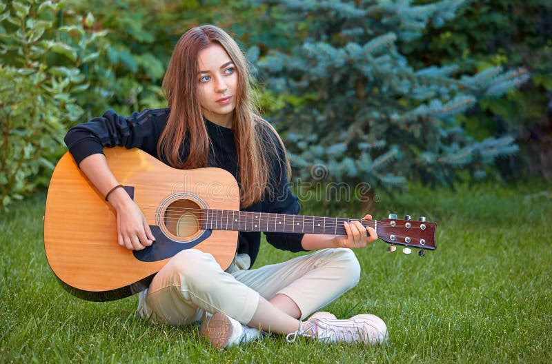 Guitarist Girl Play Music On Guitar. Beautiful Singer Stock Photo - Image Of Park, People: 152958916